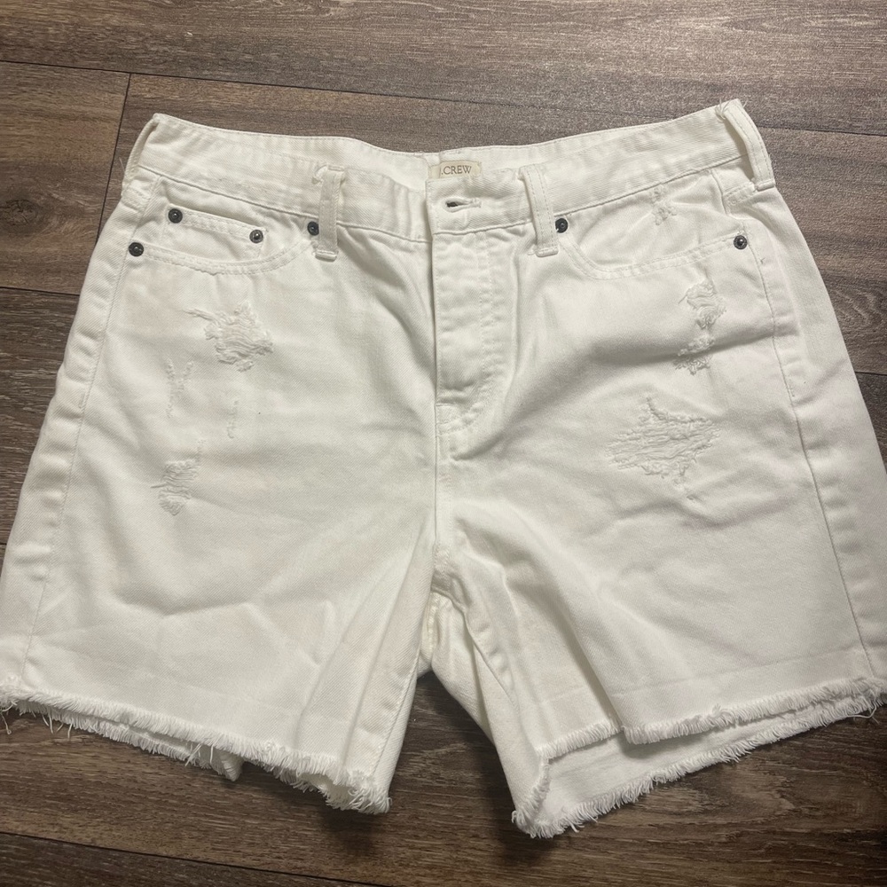 JCrew white denim distressed mid length shorts